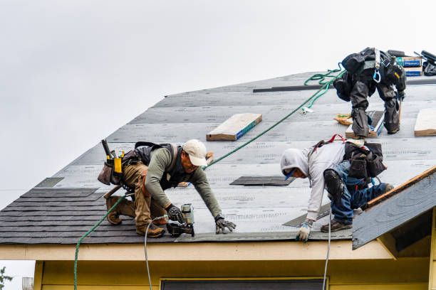 Professional Gutter Installation technician working in Dover, NH